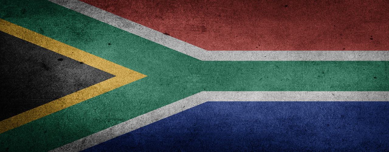 Un vol Afrique du Sud pas cher avec Algofly illustré par son drapeau national symbolisant la convergence vers l'unité.